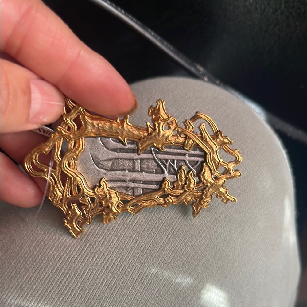Gold and Silver Ornate Brooch